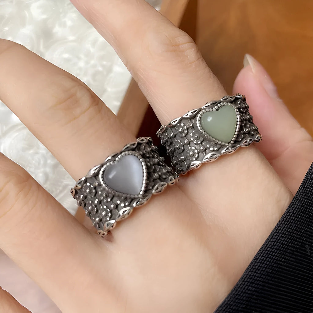Retro wide-faced adjustable heart ring in white copper plated silver with open design