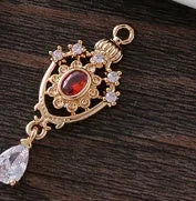 Water drop shaped pendant with hollow crown design and zircon detailing in five colour options
