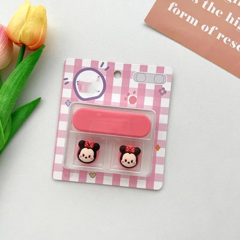 Plastic desktop clip for organising a magnetic hub charging cable, shown in one of ten colour variations.