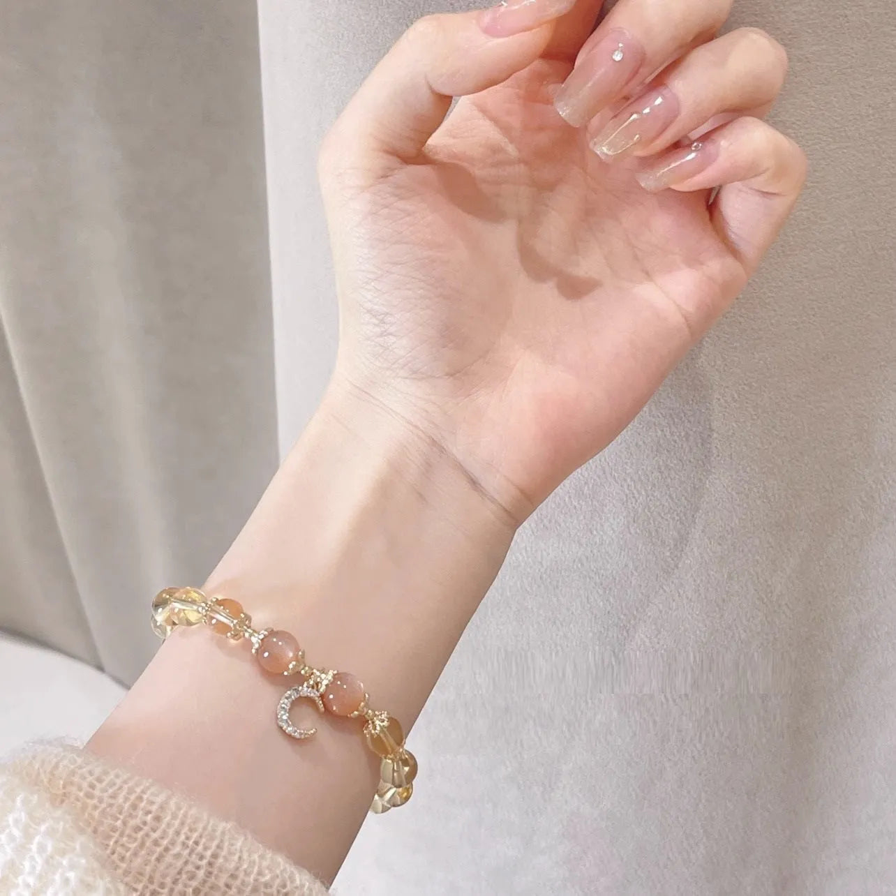 Chinese style women's crystal bracelet with electroplated 14K gold finish and diamond shape design