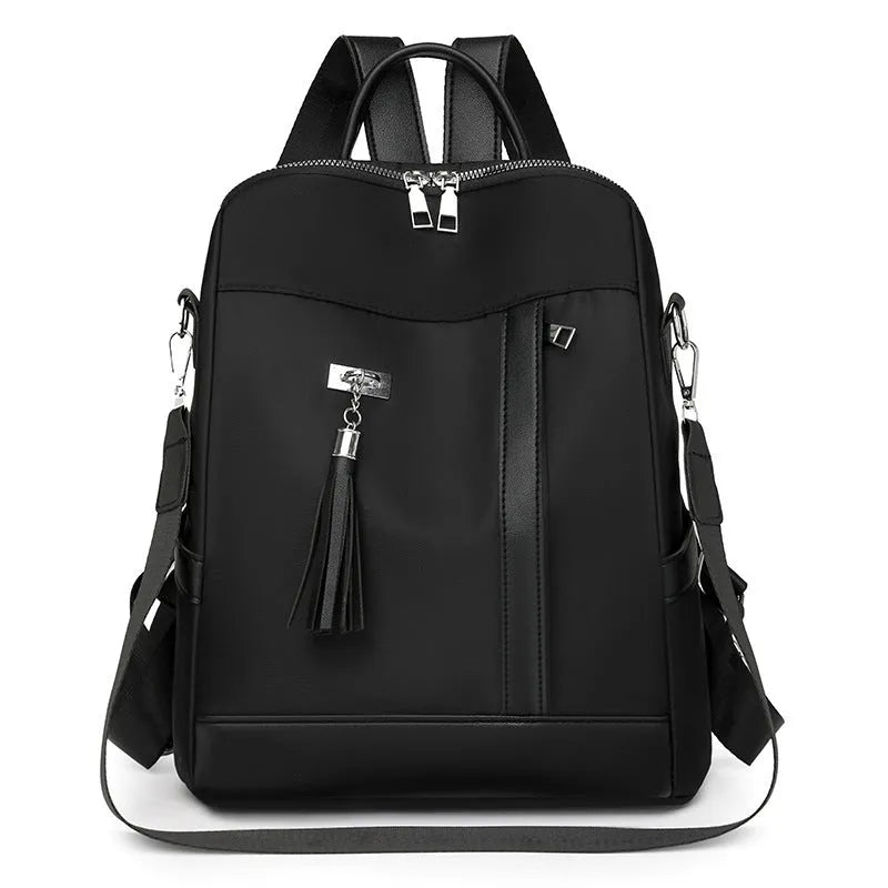 Large black PU backpack with a three-dimensional pocket, shown open to reveal internal phone pocket.