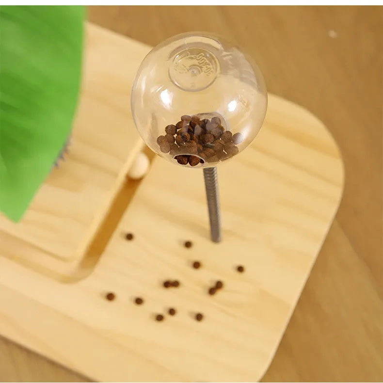 Wooden vertical cat scratching post with integrated food drop ball in canna colour