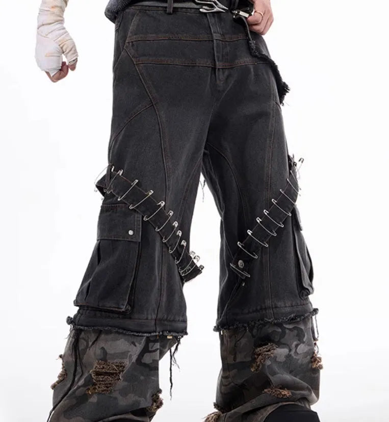 Men's grey jeans with camouflage print panels and ribbed texture panels on the legs.