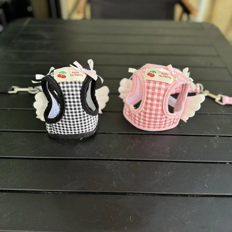 Cotton chest and back harness for small dogs in black and pink colours with adjustable sizing