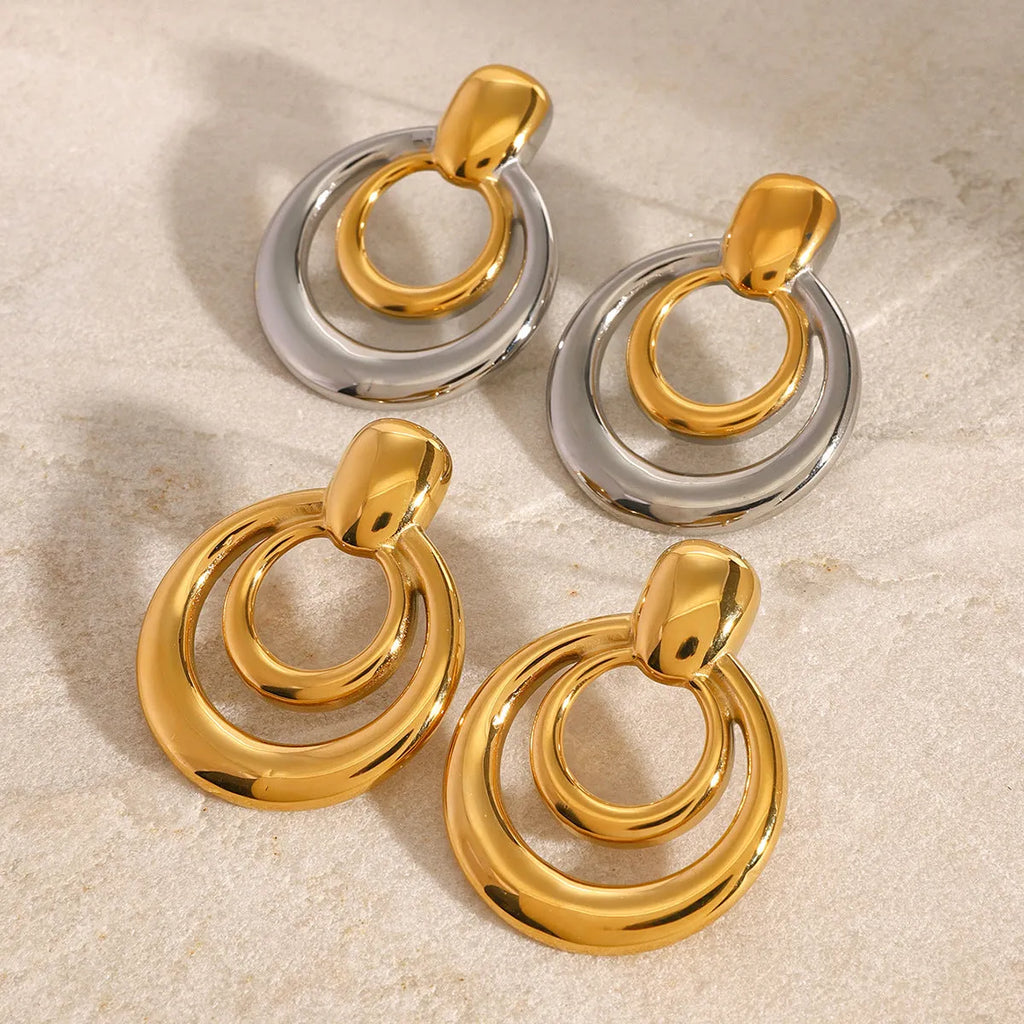 18K gold plated double layer hollow stud earrings with round geometric shape on titanium steel