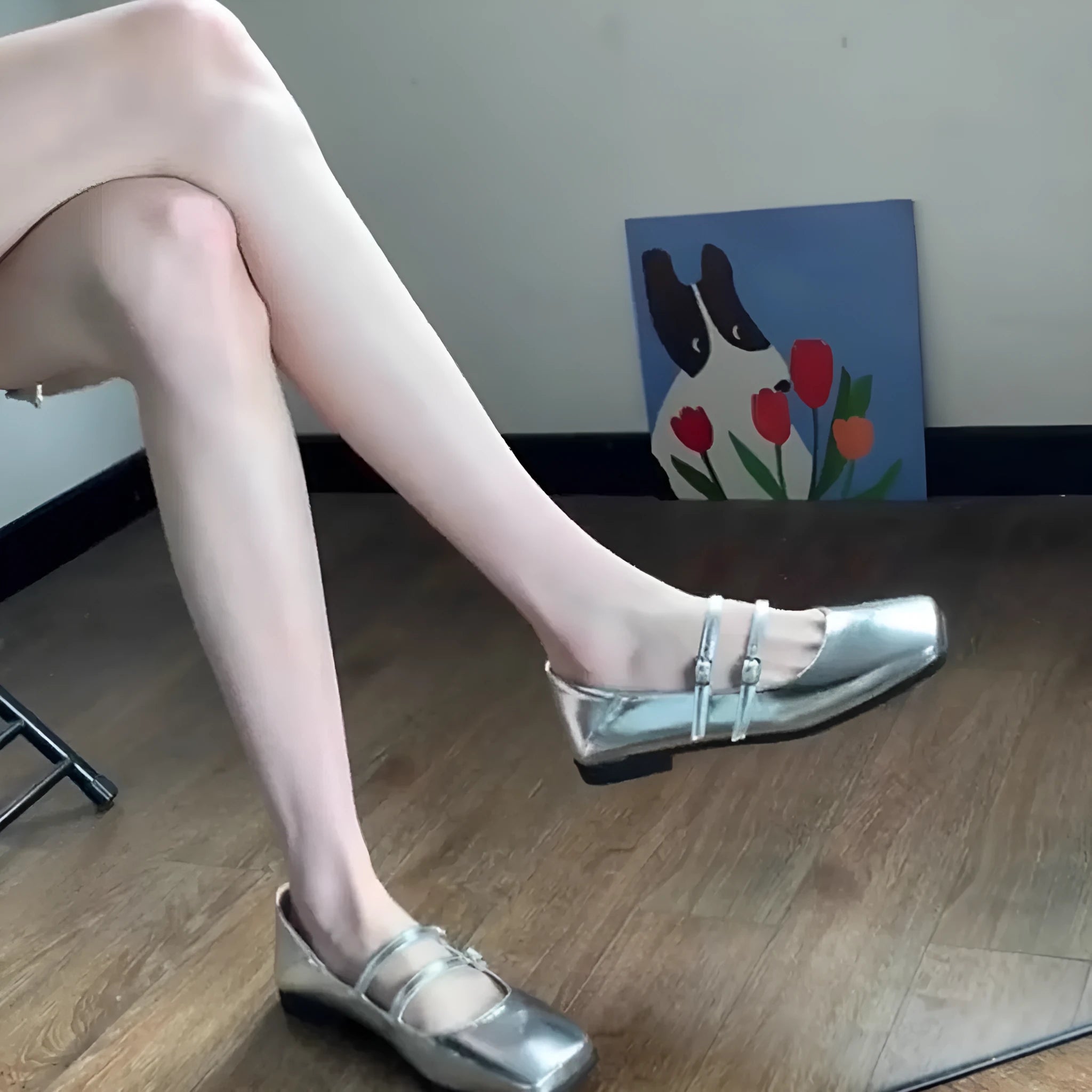 Silver women's Mary Jane shoes with cross buckle strap and flat heel