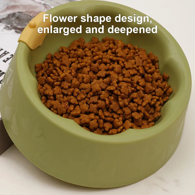 Green plastic anti-tipping pet bowl for dog and cat food and water.