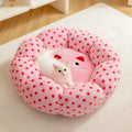 Pink dot pattern fabric cat bed for pets, shown in 45cm and 65cm diameter sizes
