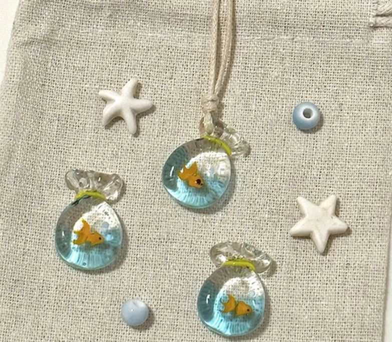 Women's coloured glaze skirt pendant necklace with joker design on cotton linen chain