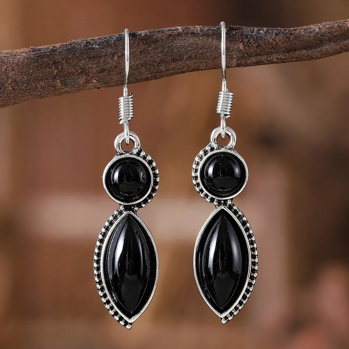 Vintage geometric bohemian earrings with electroplated black and purple finish