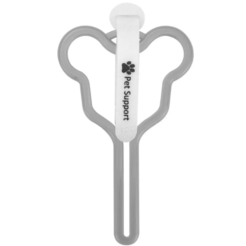 A hands-free dog waste bag holder with a Velcro strap, attached to a dog leash.