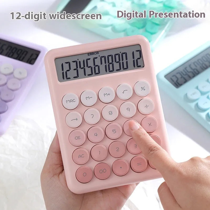 Solar-powered desktop calculator with a violet and white gradient colour design on a desk.