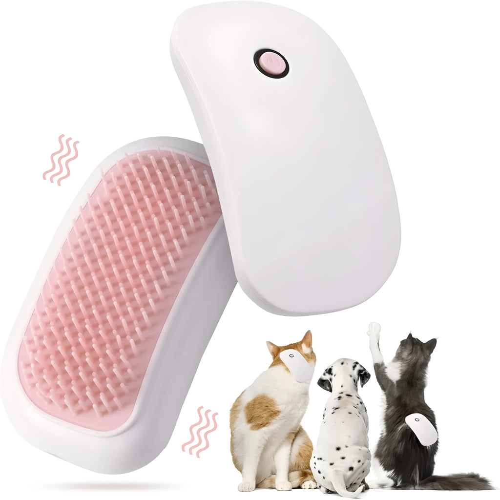Pink handheld electric pet massage brush with soft white teeth on a table.