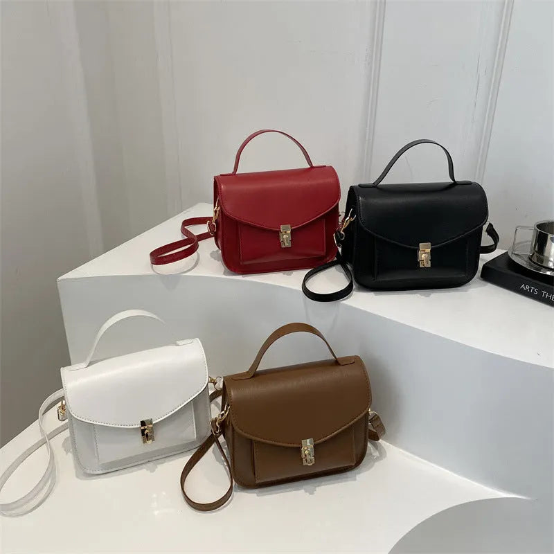 PU leather messenger bag in horizontal square shape with crossbody strap and document compartment