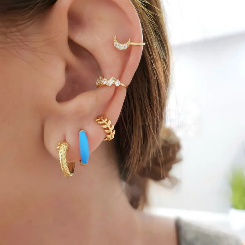 Curved oval epoxy drop earrings in multiple colours with silver needle posts and geometric U-shaped design