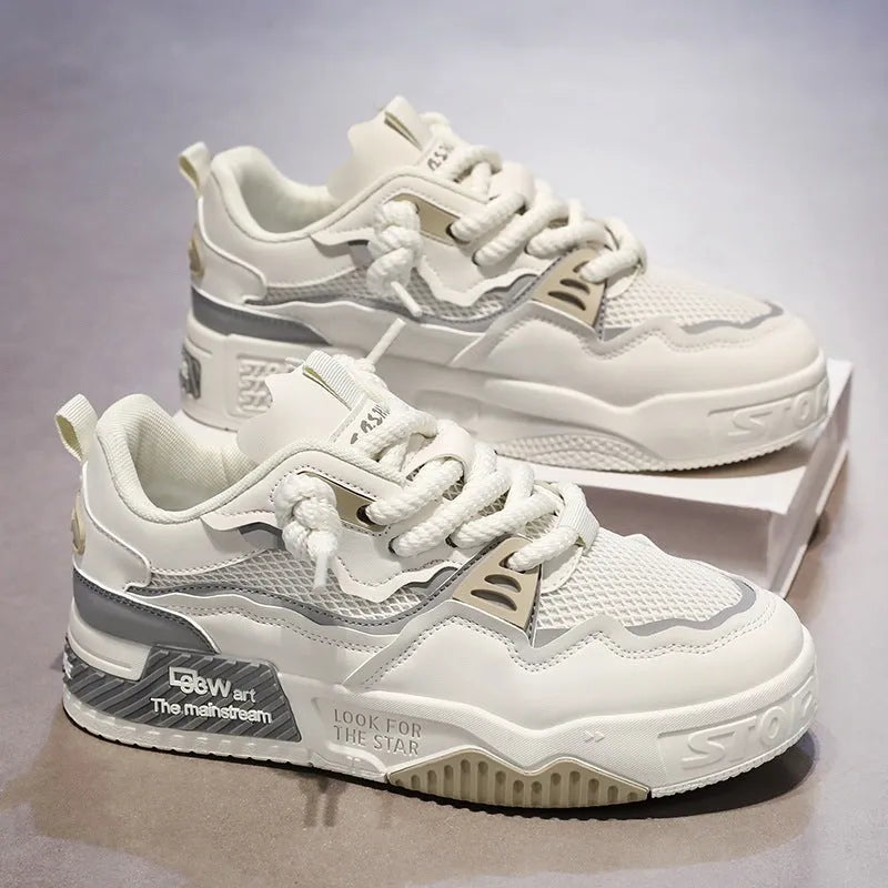 Men's white low-top board shoes with colour-matched details and rubber soles