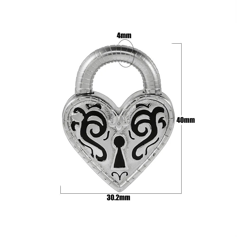 Close-up of a women's stainless steel heart-shaped ear piercing in a gold colour finish.