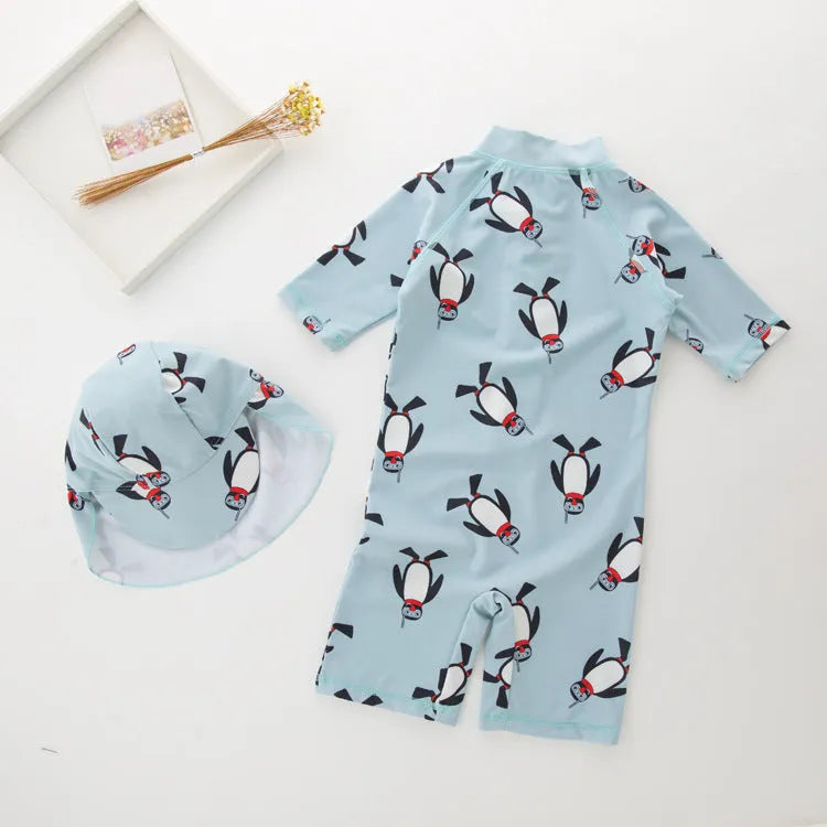 Boys penguin print long sleeve swimsuit with matching swimming cap