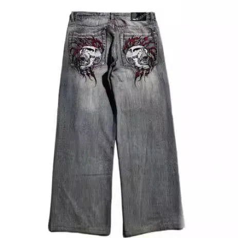 Grey washed-out men's wide-leg straight jeans with a mid-waist and zipper fly.
