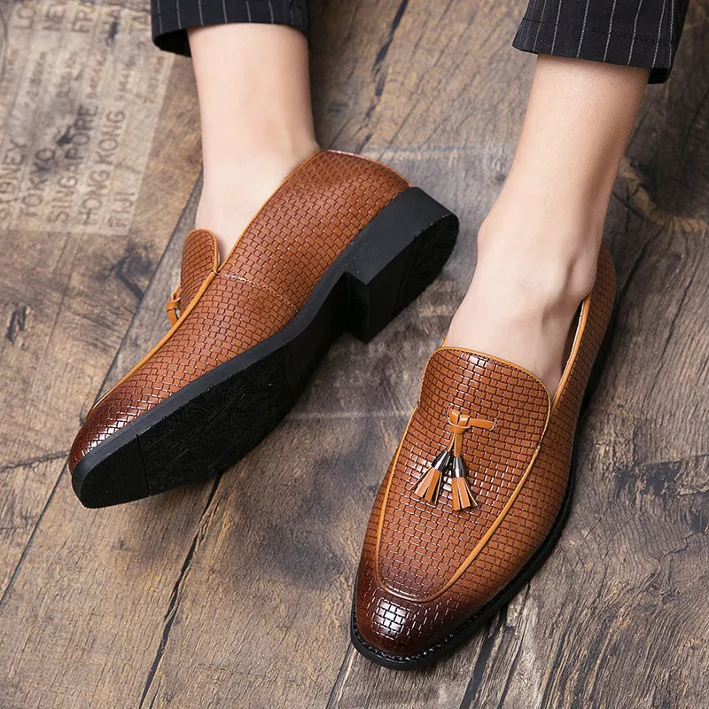 Men's black pointed toe slip-on shoes with a tassel, made from artificial PU leather.