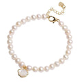 Women's freshwater pearl bracelet with fan-shaped arrangement of 5-6 near round pearls on 16cm band