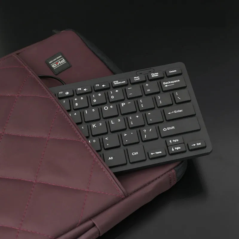 USB wired mini keyboard in black, white, pink or blue with 280x125mm dimensions