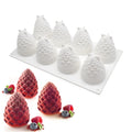 Silicone baking mould with six pineapple and pine cone shaped cavities for desserts