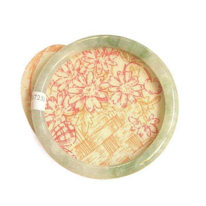 Green geometric Chinese style jade waxy bracelet shown on a wrist, highlighting its 10mm width and detailed pattern.