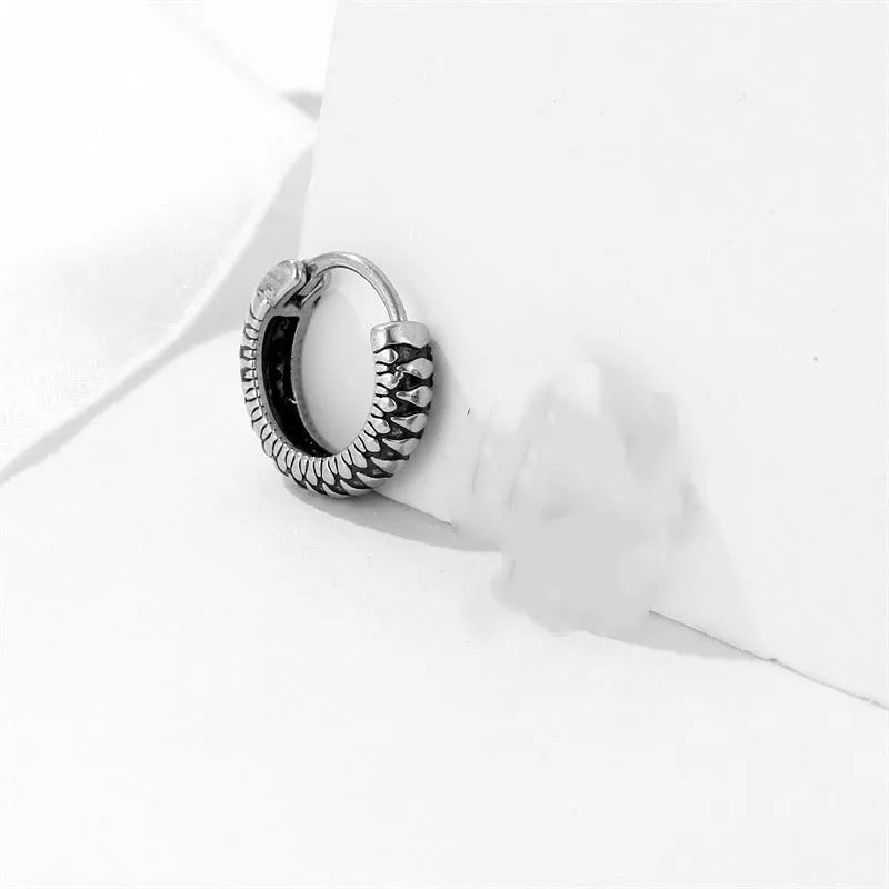 Silver geometric stripe earrings with retro twist design and sports style aesthetic