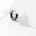 Silver geometric stripe earrings with retro twist design and sports style aesthetic