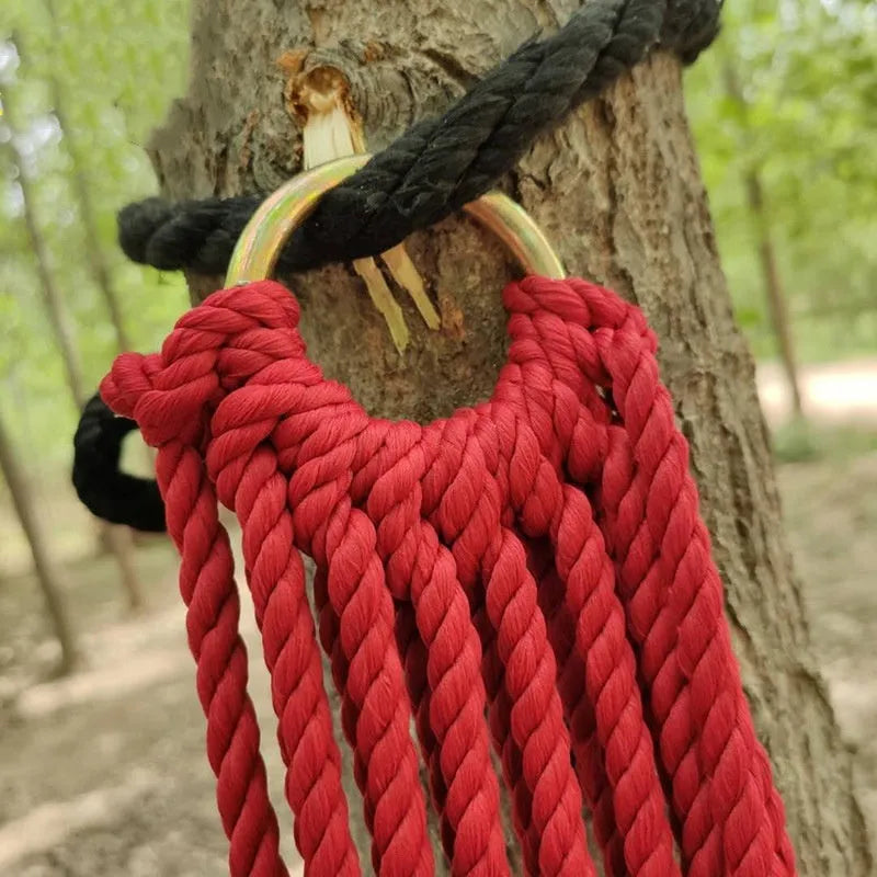 Nylon rope mesh hammock measuring 1.1m wide by 2.1m long with bold pattern design