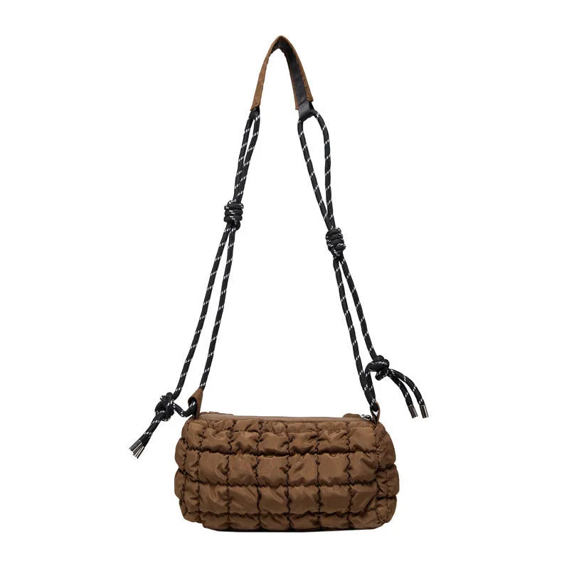 Women's lightweight nylon pillow-shaped messenger bag with a crossbody strap in six colour options.