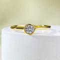Minimalist crown-shaped silver ring with linear detailing in platinum or gold finish