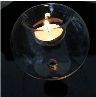 Clear round handmade hollow glass candle holder in three size options