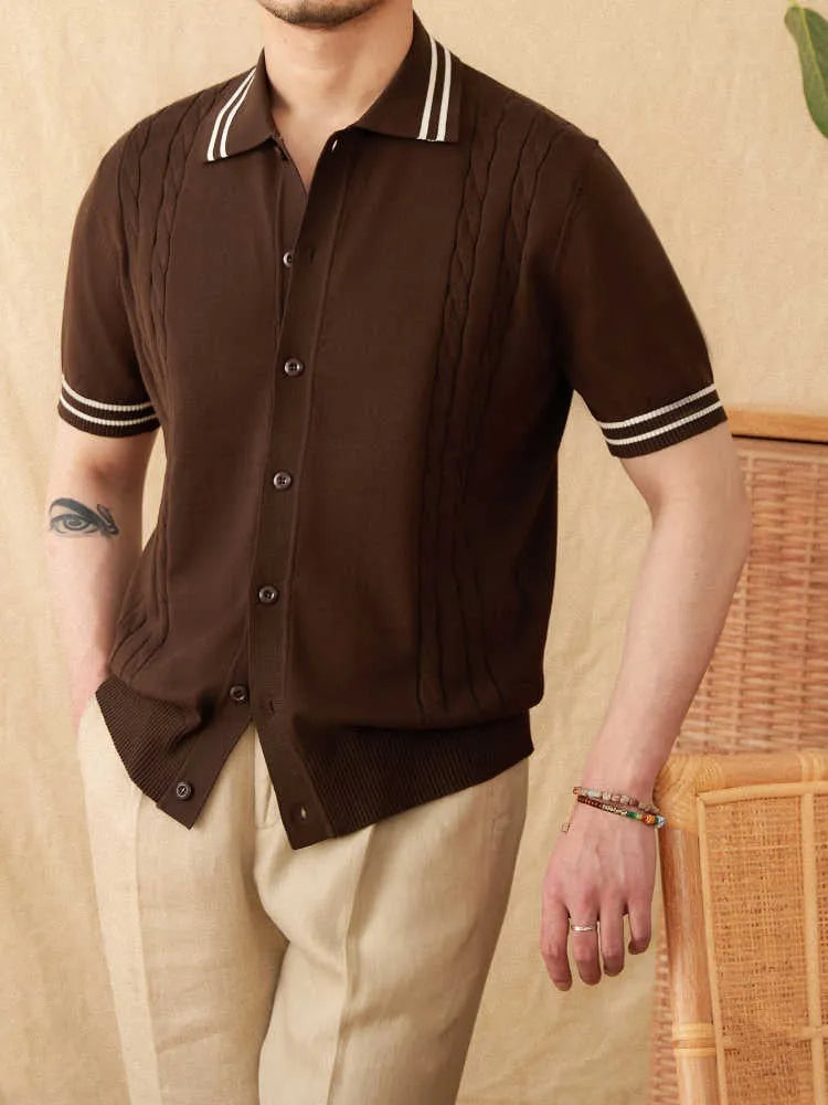 Man wearing a knitted apricot-coloured polo shirt with a lapel collar and short sleeves.