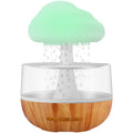 White cloud-shaped humidifier with LED lights and essential oil diffuser