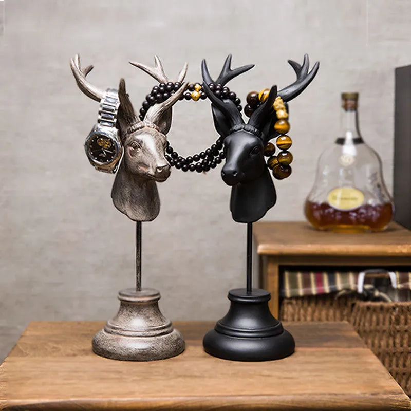 Woodland animal resin sculpture home decoration in black, white, and wood colour finishes.