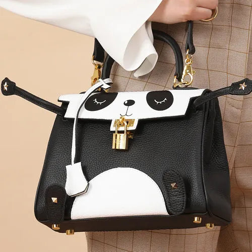 Square horizontal cow leather handbag with panda animal print pattern showing printing elements