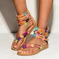 Ethnic beaded petal sandals with Roman shoe design and floral decoration