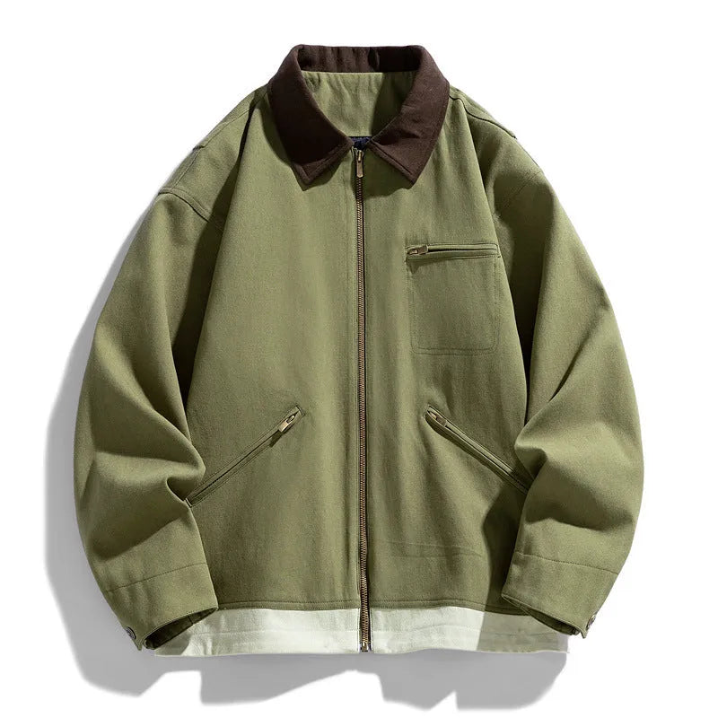 Man wearing a mint green loose-fit Korean style retro workwear jacket with contrast lapels.