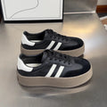 Women's vintage distressed leather sneakers with round toe and lace-up front closure