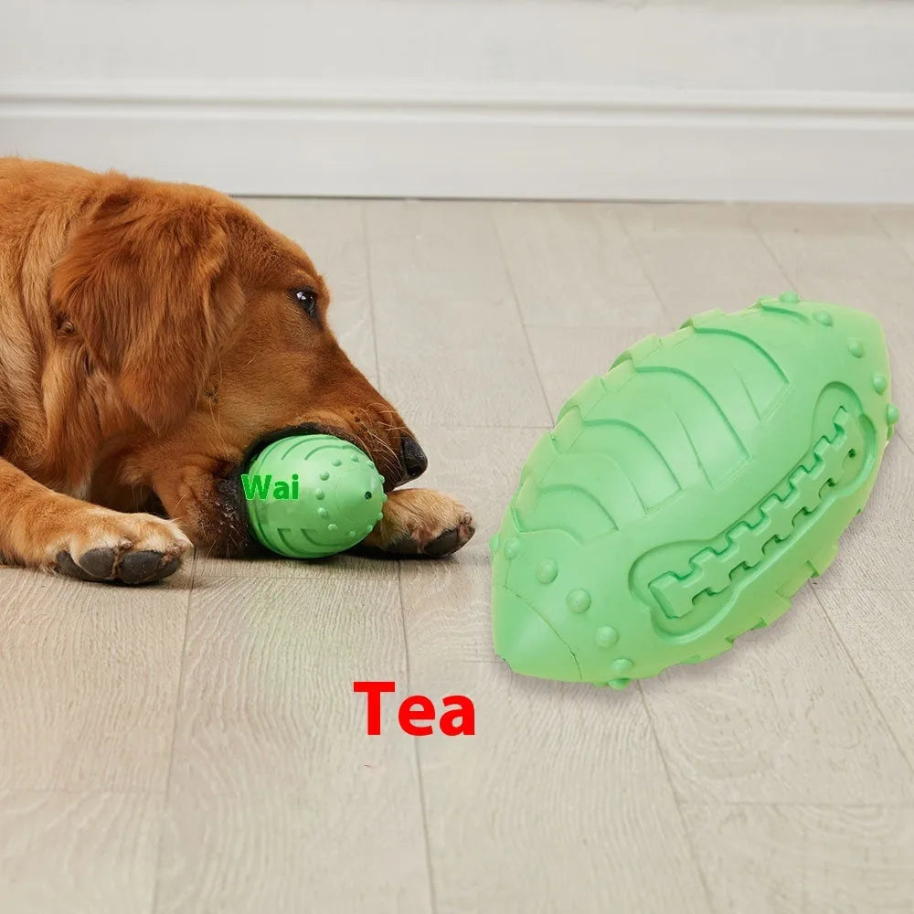Light green rugby-shaped rubber dog toy with bite-resistant texture for chewing and interactive play