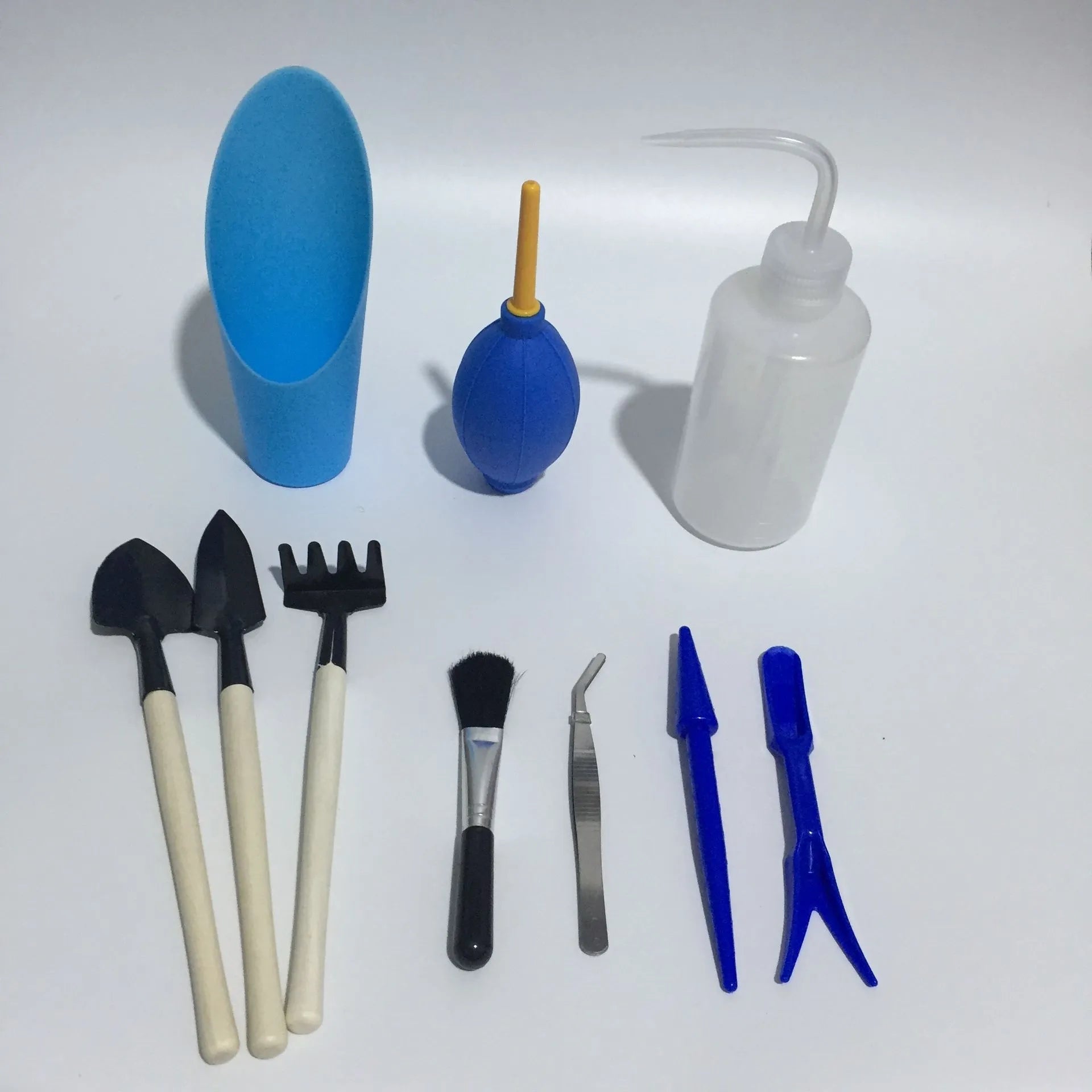 Succulent gardening tool set with mini shovel, tweezers, drip kettle, and rake for indoor plants