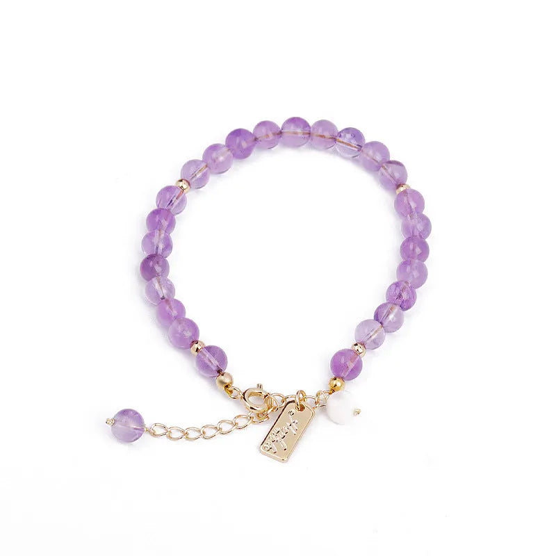 Women's lavender amethyst crystal bracelet with animal zodiac design in dark and light colour options