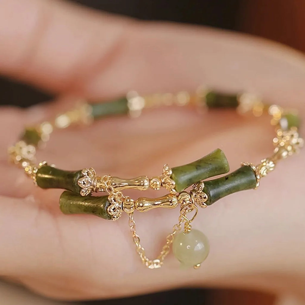 Women's plum wine coloured bamboo joint beaded bracelet with a glossy glaze finish.