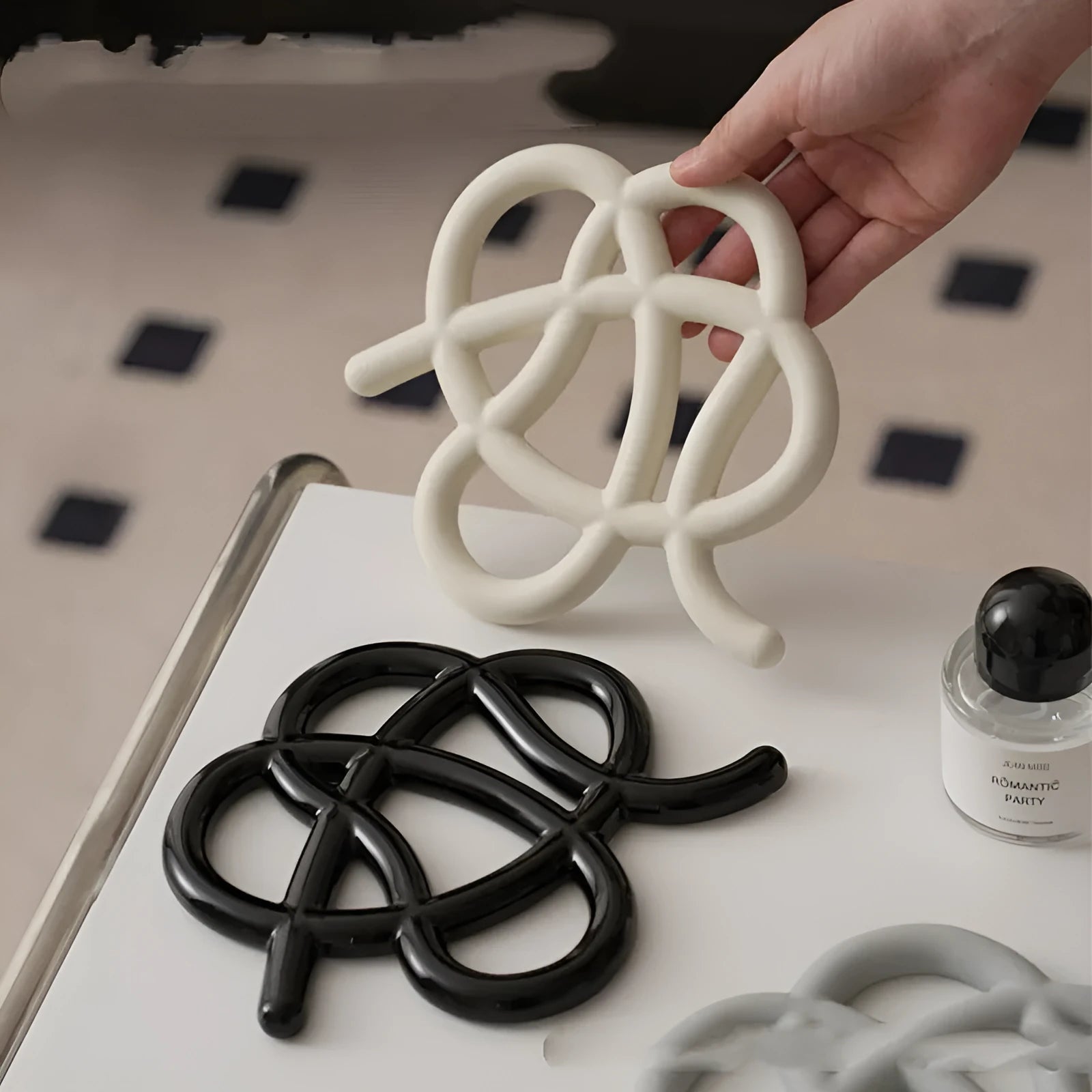 Ceramic heat proof mat in irregular shape on dining table