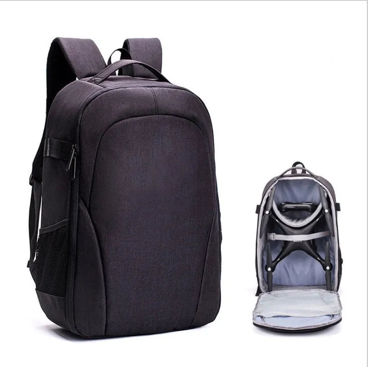 Black Oxford cloth drone backpack with camera and laptop compartments open.