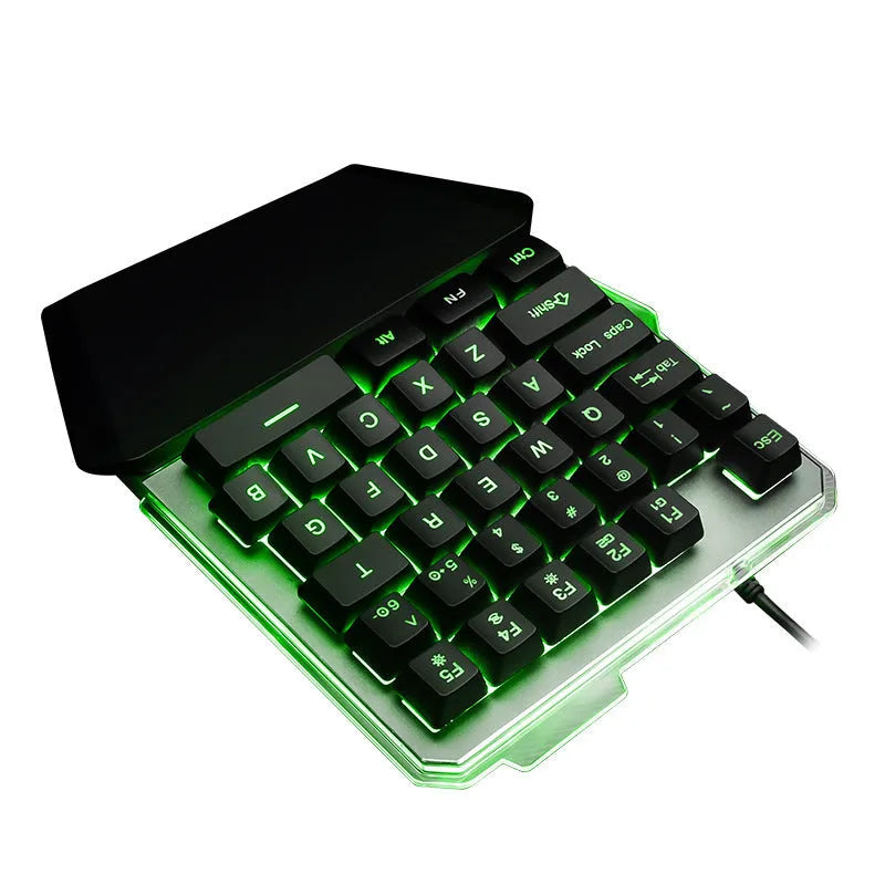 Black G40 one-handed mechanical keyboard with RGB backlighting on a desk.