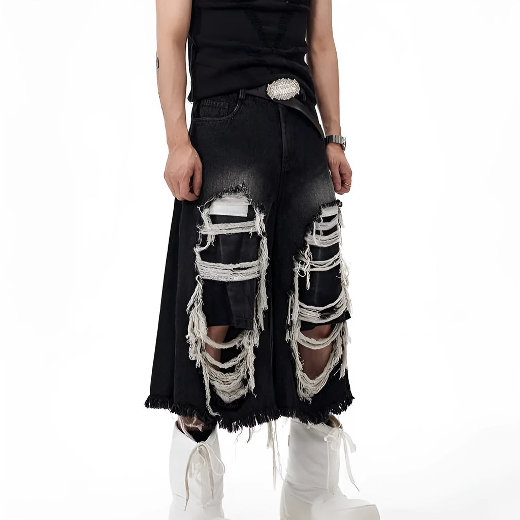 Black cropped wide leg jeans with ripped patch details and mid-high waist