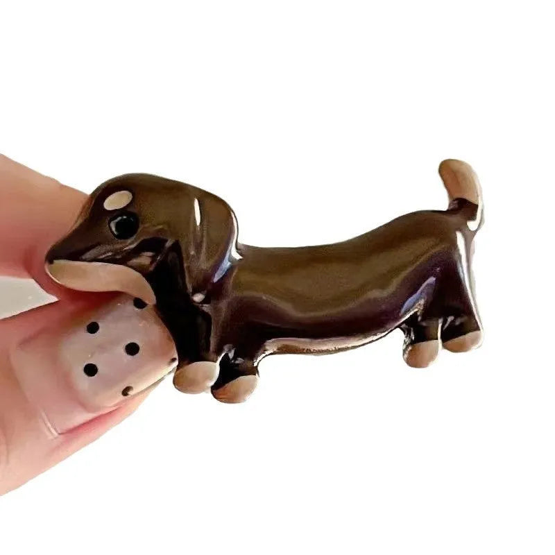 Dachshund dog design hair barrettes with electroplated finish in loose delicate styling